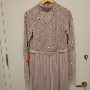 Blush pink long sleeved bridesmaid dress